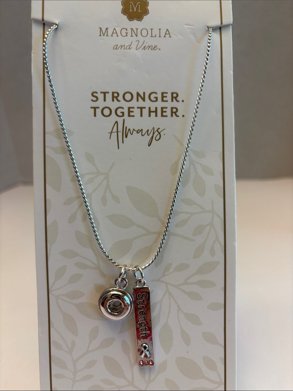Magnolia and Vine Silver 'Strength' Charm Necklace
